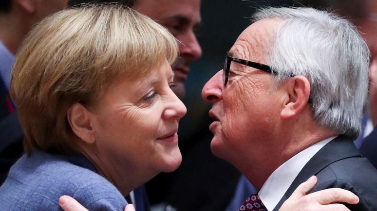 Юнкер: Меркель правильно поступила, открыв границы для мигрантов
