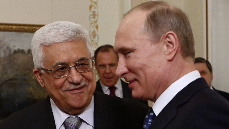 في لقاء مع عباس بوتين يدعو إلى استئناف عملية السلام في الشرق الأوسط