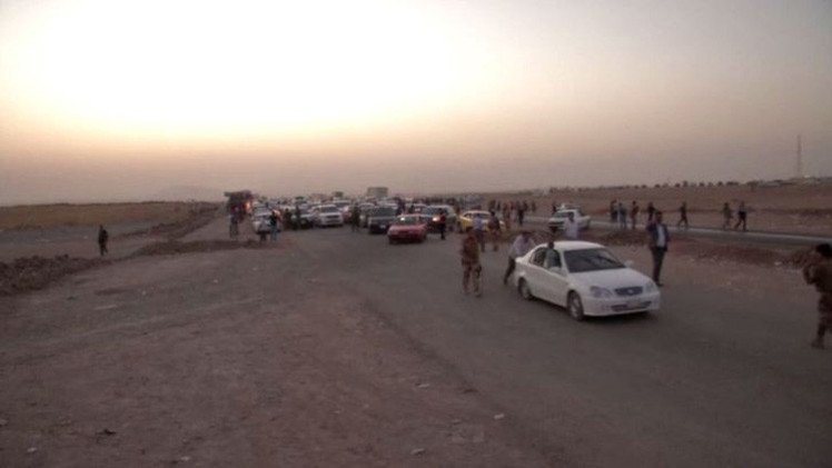 آلاف المسيحيين يغادرون قراهم شمال العراق بعد تعرضها لهجمات المسلحين 