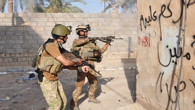 العراق.. استمرار المعارك في نينوى وتحرير رهائن بالأنبار