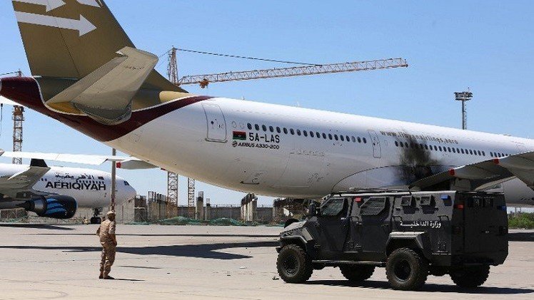 طرابلس تطلب حماية أممية لموانئها..واتفاق لوقف إطلاق النار حول المطار