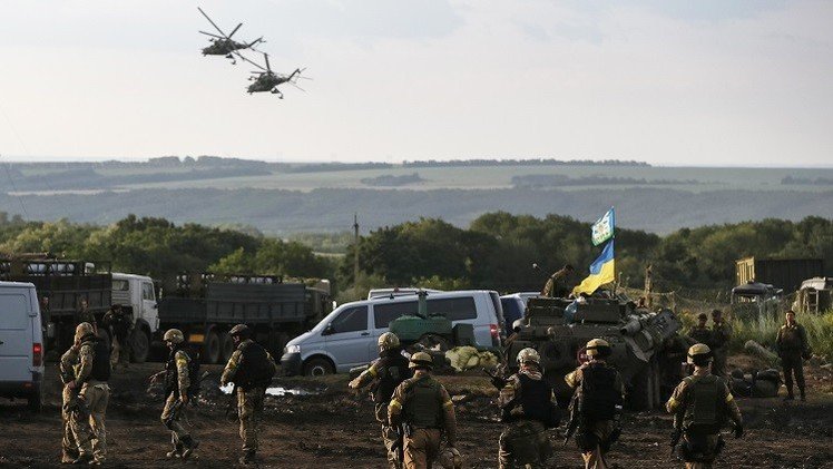 بوتين وايبوت يؤكدان ضرورة وقف النار في أوكرانيا من أجل التحقيق في تحطم الماليزية