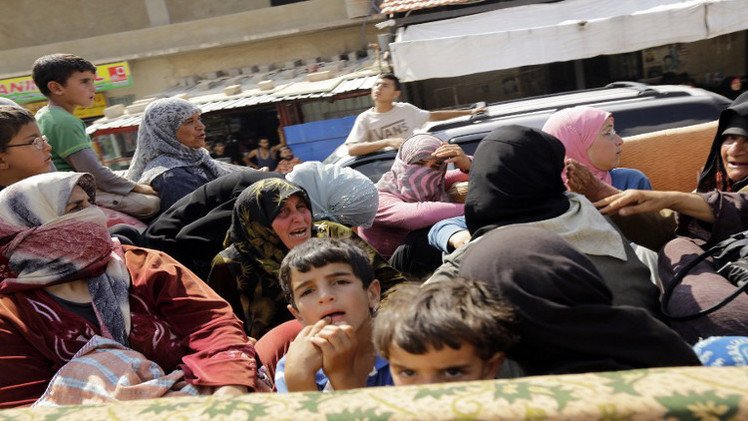 مئات اللاجئين في لبنان يعودون إلى سورية