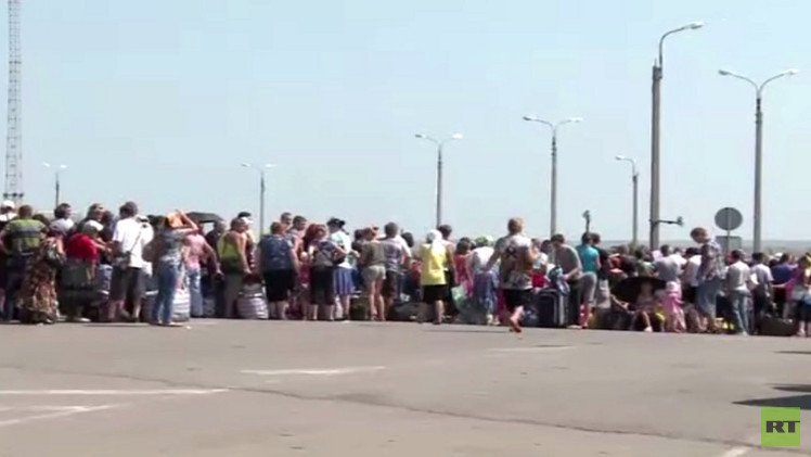 كاميرا RT ترصد الأعداد المتزايدة من اللاجئين الأوكران الى روسيا