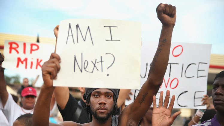 بوشكوف: تفريق المحتجين في فيرغسون الأمريكية من مظاهر الدكتاتورية