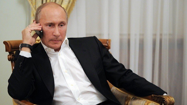 بوتين يبحث مع باروزو وهولاند الملف الأوكراني