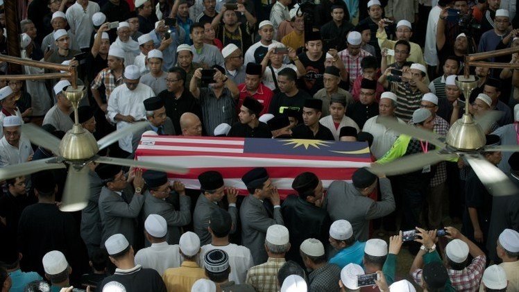 نقل 9 جثث لضحايا كارثة "الماليزية" إلى كوالالمبور