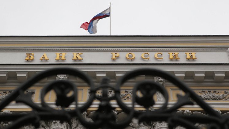 المركزي الروسي يتوقع نزوح 100 مليار دولار من روسيا في 2014