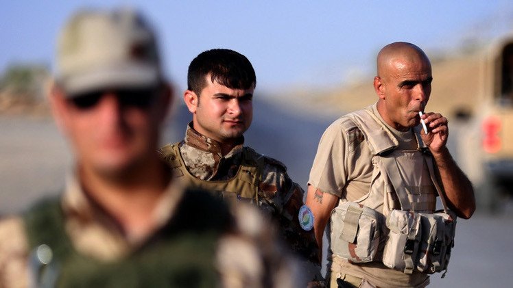 مجموعة من البيشمركة تغادر قاعدتها في العراق متوجهة إلى عين العرب