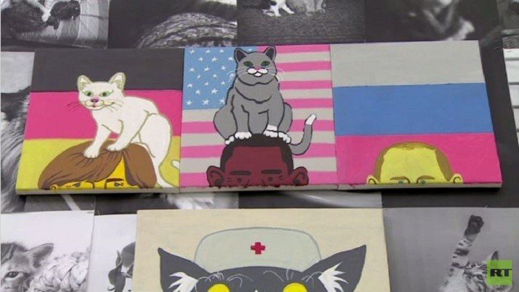 موسكو.. معرض مختص بالقطط يتخلله أوباما وميركل (فيديو)