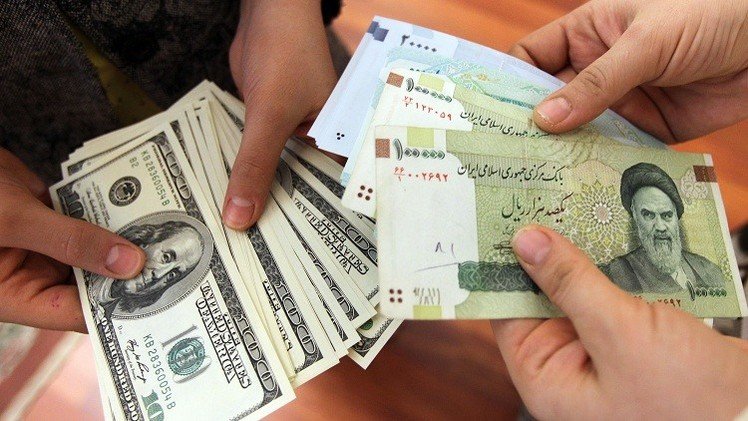 إيران توقف التعامل بالدولار الأمريكي في التبادلات التجارية