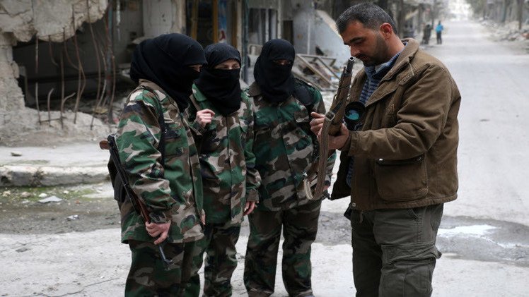 جهاديات "داعش" يصدرن دليلا للنساء في "دولة الخلافة"