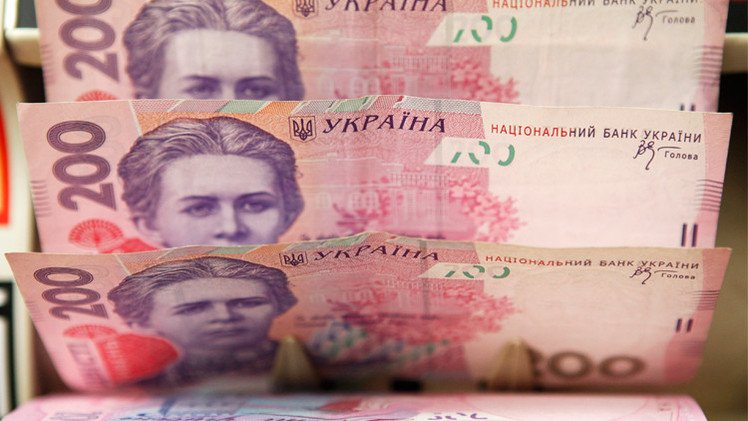 الهريفنا الأوكرانية تهوي إلى مستويات قياسية أمام الدولار