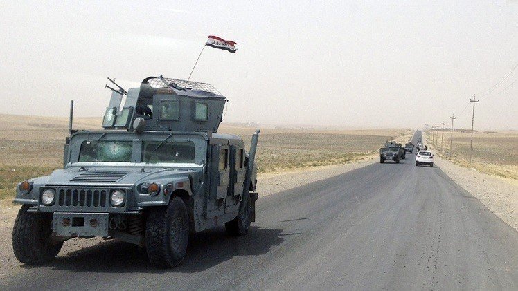 القوات العراقية تحاصر تكريت وتستعد لاقتحامها