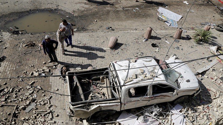 مقتل 10 أشخاص على الأقل في هجومين ببغداد 