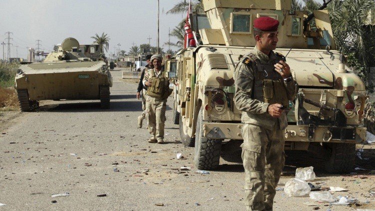 القوات العراقية تحرر مبنى قائم مقامية بيجي من قبضة 