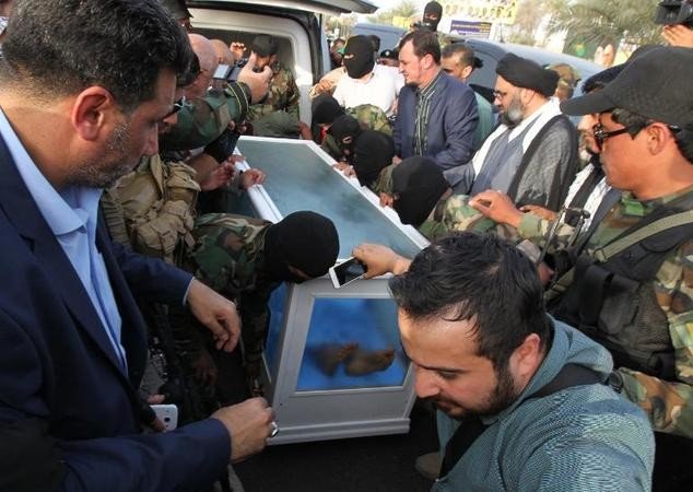 الحكومة العراقية تتسلم جثة يرجح أنها تعود لعزت الدوري (صور)