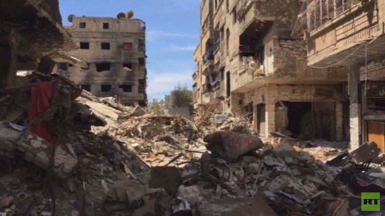 مباحثات في دمشق لحل أزمة مخيم اليرموك