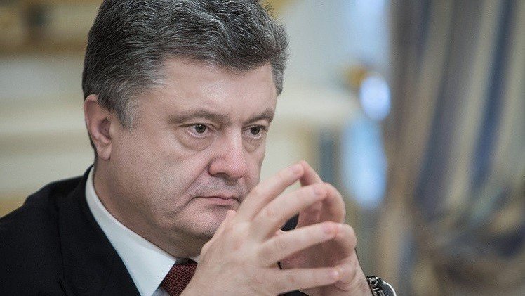 بوروشينكو يوقع قانونا يسمح بدخول قوات أجنبية إلى أوكرانيا