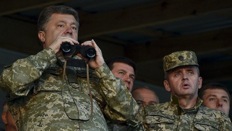 بوروشينكو يؤكد اهتمامه بتوسيع تعاون كييف مع الناتو