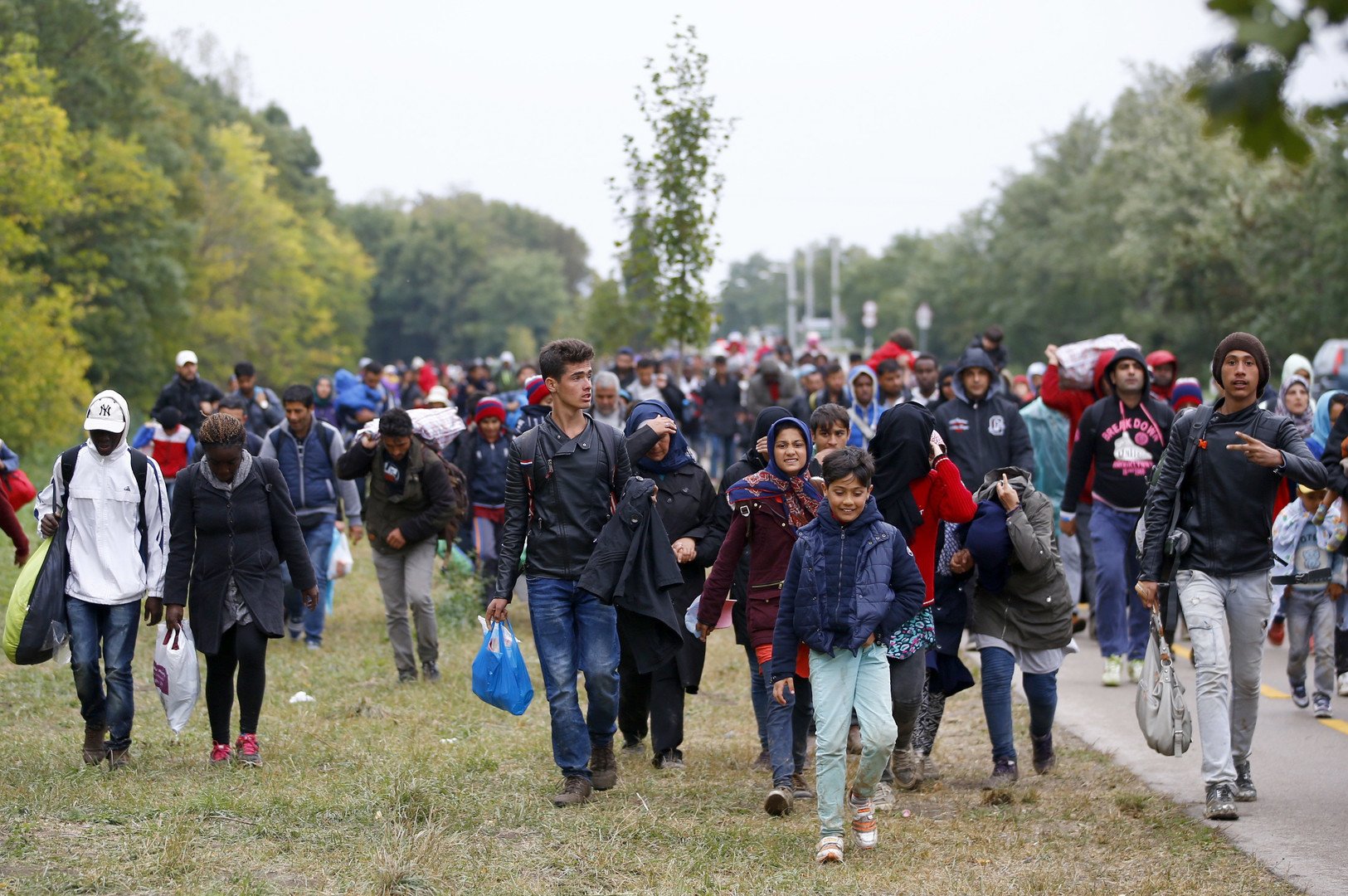 الرئيس البولندي دودا يحذر من الأوبئة التي قد ينقلها المهاجرون معهم 