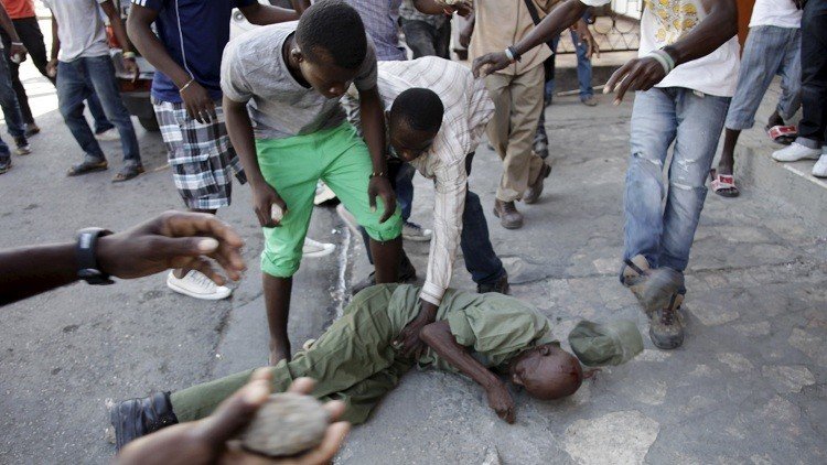 محتجون يرجمون عسكريا حتى الموت في هايتي 