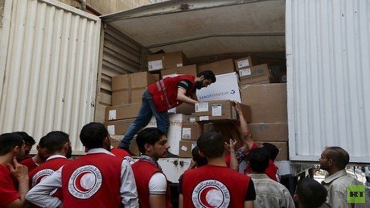 الصليب الأحمر: وصول مساعدات إلى بلدة محاصرة جنوب غرب دمشق