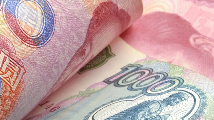 موسكو وبكين نحو تفعيل اَلية مبادلة العملات بينهما 