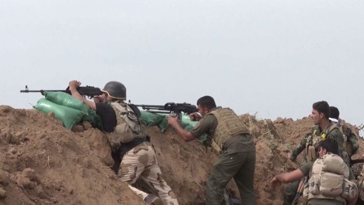 بالفيديو.. معركة بين الحشد الشعبي العراقي و"داعش" لاستعادة الـ"بشير"