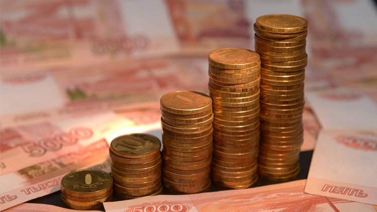 الروبل يكسر حاجزالـ 65 النفسي أمام الدولار