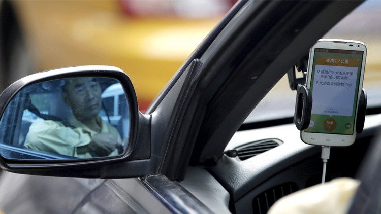 أبل تراهن بمليار دولار على منافس أوبر الصيني  