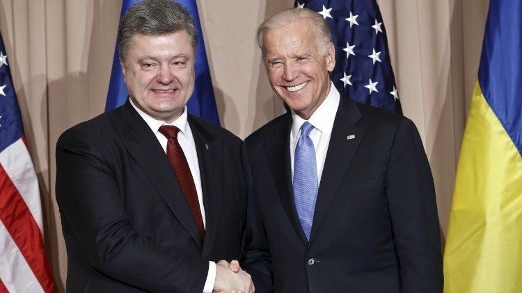 بايدن يعد بوروشينكو بدعم مالي بمليار دولار