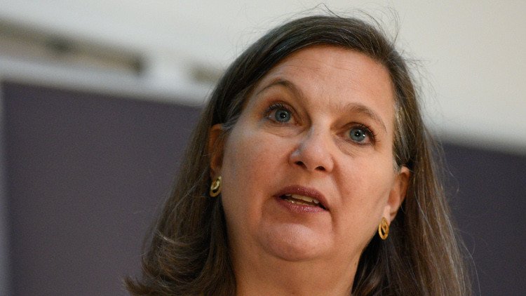 نولاند: تنفيذ "مينسك" قد يرفع العقوبات عن روسيا