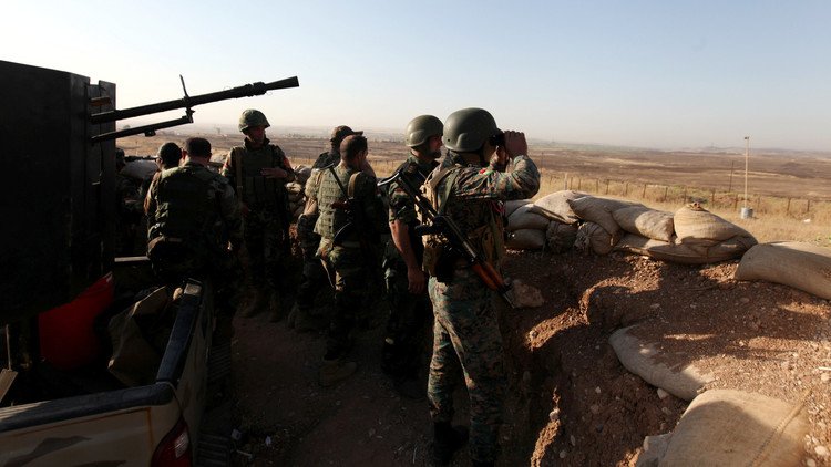 جنود من التحالف مع البيشمركة في هجوم قرب الموصل