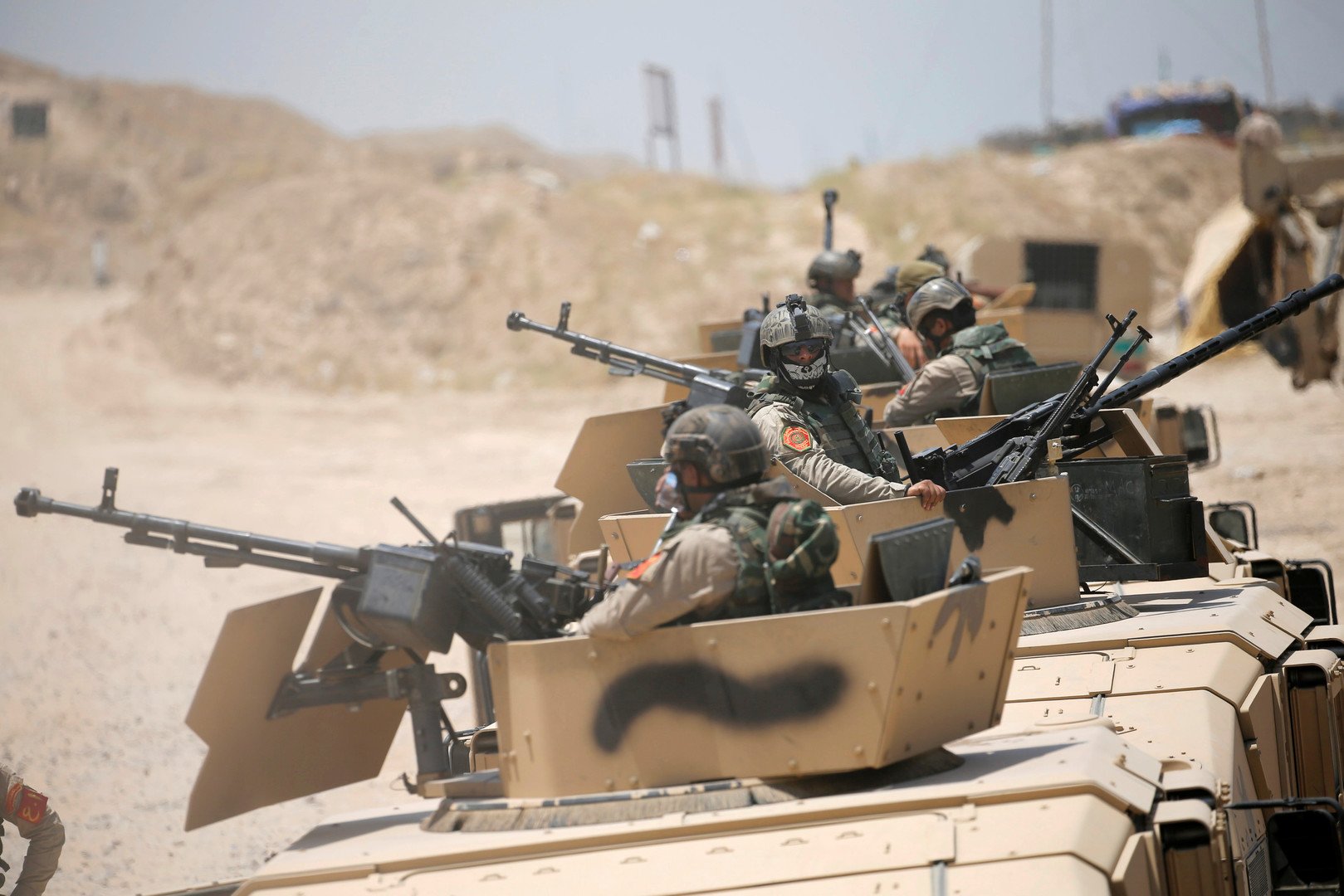 تجمعات لقوات الحشد الشعبي والجيش العراقي قرب الفلوجة