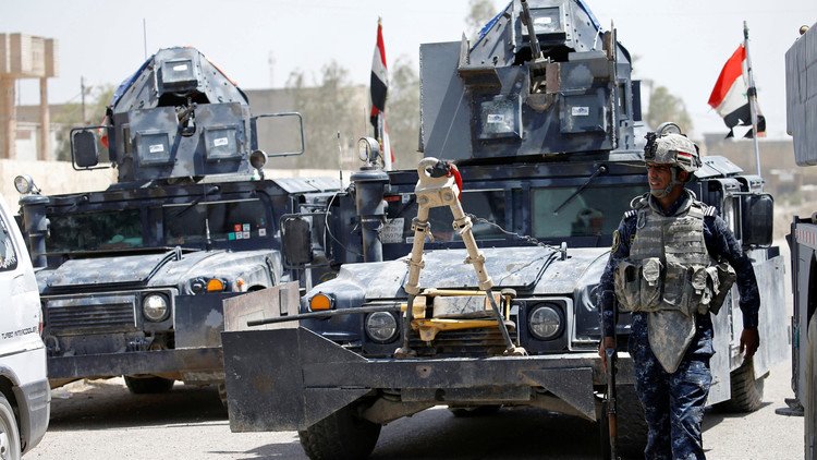 القوات العراقية تقترب من قاعدة جنوب الموصل