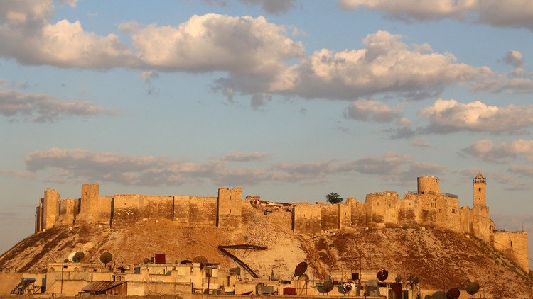 مسلحون يمنعون الرجال من مغادرة منطقة القتال بحلب