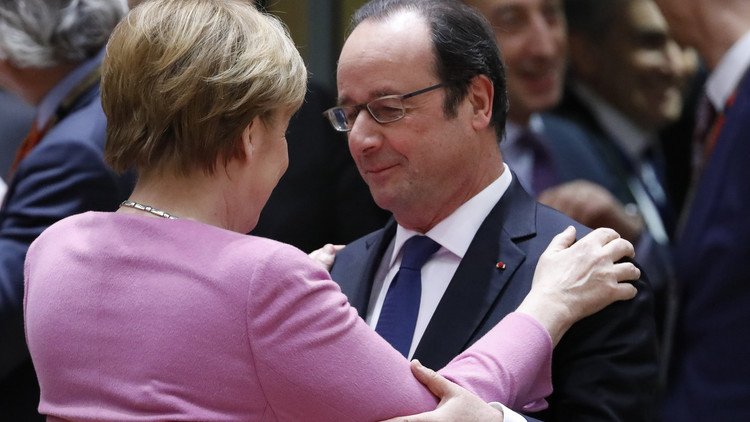 هولاند يتضامن مع ميركل في خضم الخلاف مع أردوغان