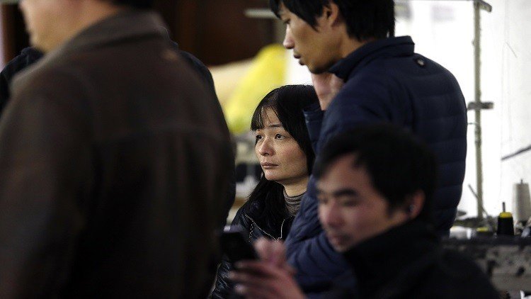 صينيون يحتجون على عدم دفع أجورهم