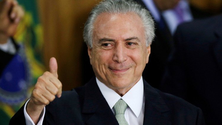 فضيحة رشوة سياسية قد تطيح برئيس البرازيل (صور)