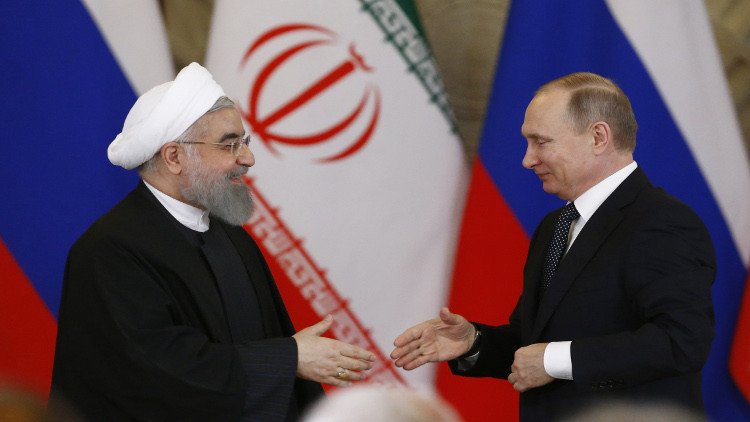بوتين يهنئ روحاني بفوزه في الانتخابات الرئاسية