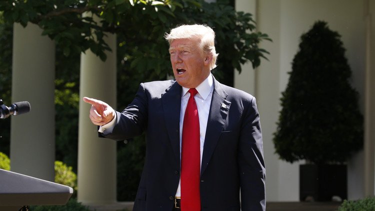 ترامب يشرح لماي وميركل وماكرون وترودو قراره الانسحاب من "باريس"