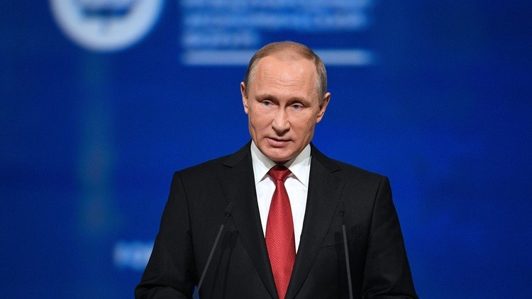بوتين: روسيا لا تدافع عن الأسد 