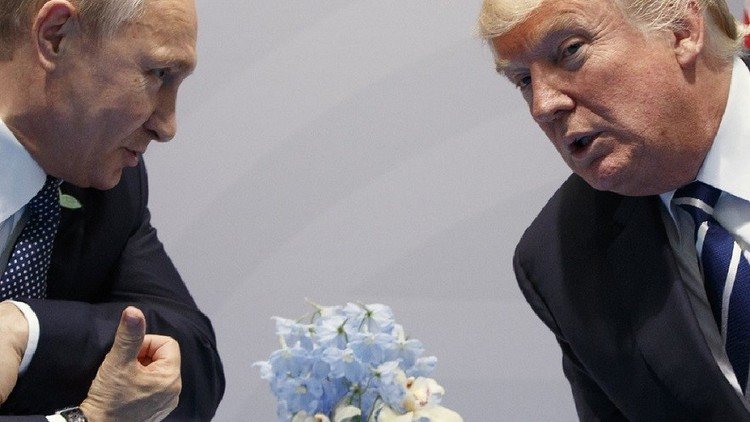 ماذا قال بوتين لترامب عقب مراسم التصوير؟