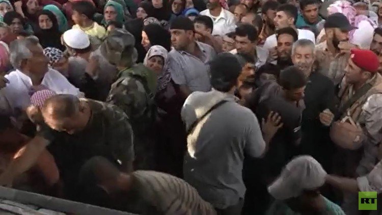 توزيع مساعدات إنسانية روسية شمال حمص