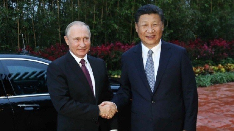 الزعيمان الروسي والصيني يتفقان على التعامل بـ 