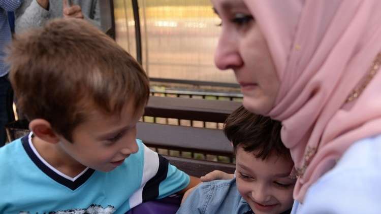 إعادة طفلين شيشانيين من العراق إلى ذويهما في الوطن