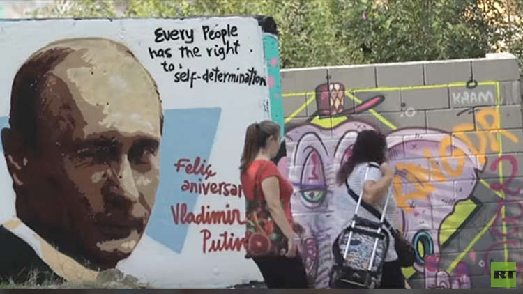 صور بوتين تظهر في مدن أوروبية بمناسبة عيد ميلاده