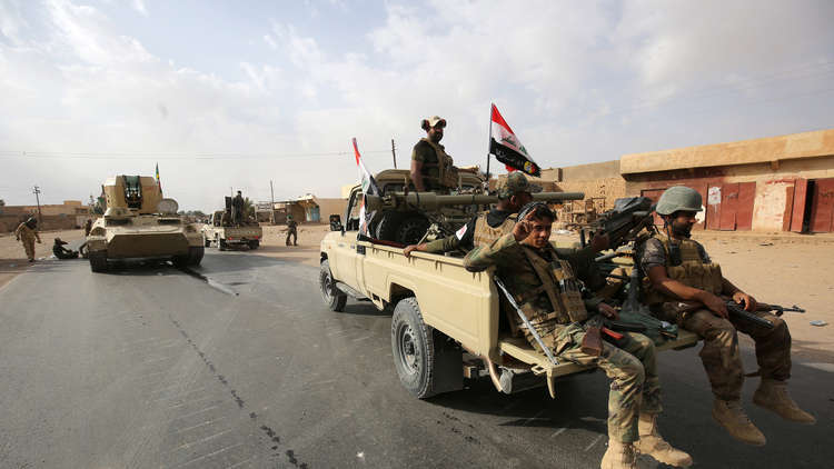 العبادي يعلن تحرير قضاء القائم على الحدود مع سوريا بالكامل