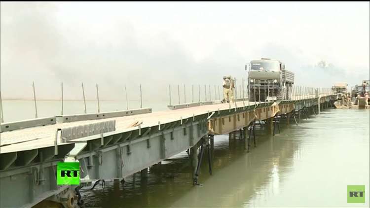 شبهات بتورط  الولايات المتحدة في تدمير الجسر الروسي على نهر الفرات بسوريا!